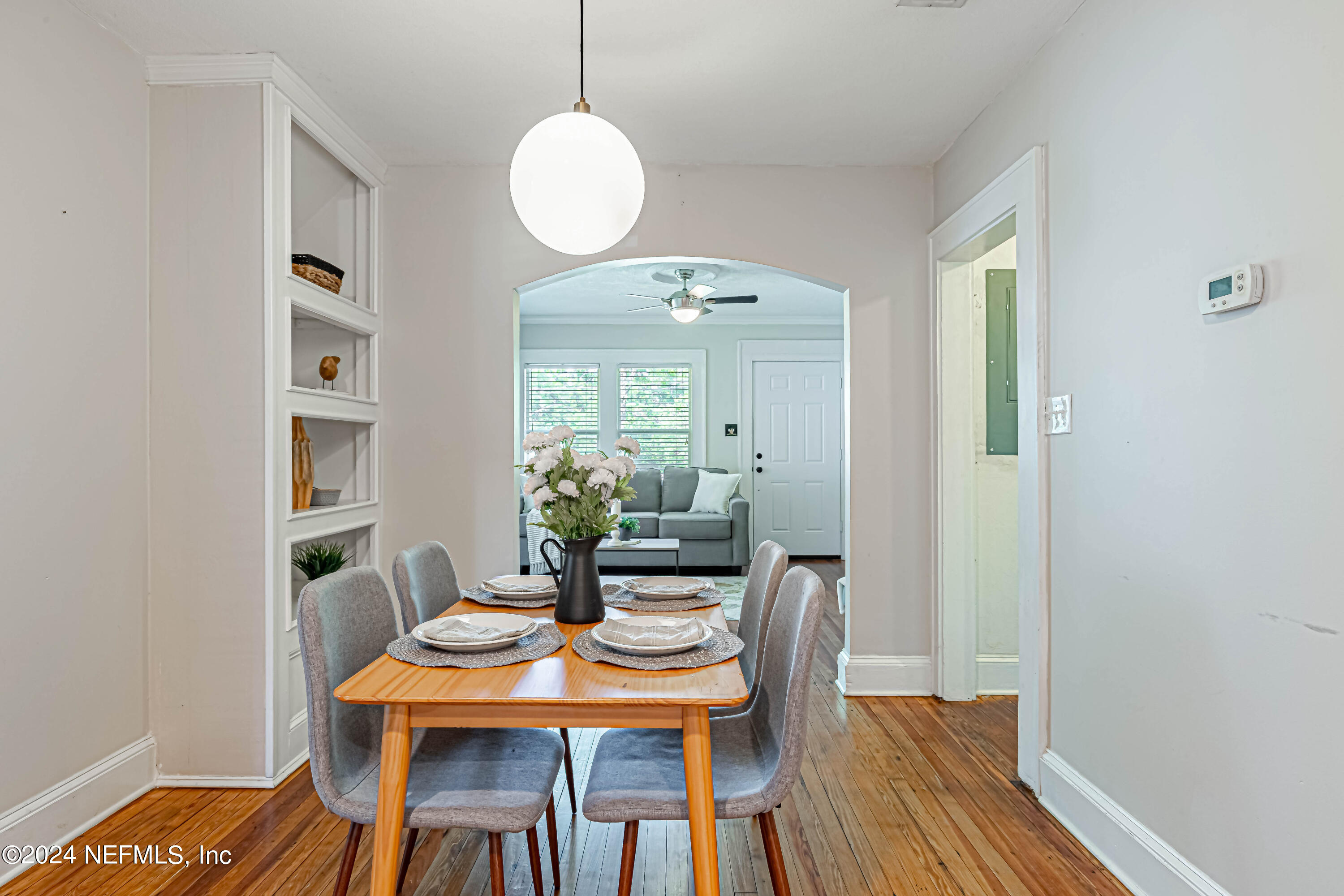725 Cherokee Street Jacksonville, FL 32205 - Photo 14 of 41 a view of a dining room with furniture and wooden floor