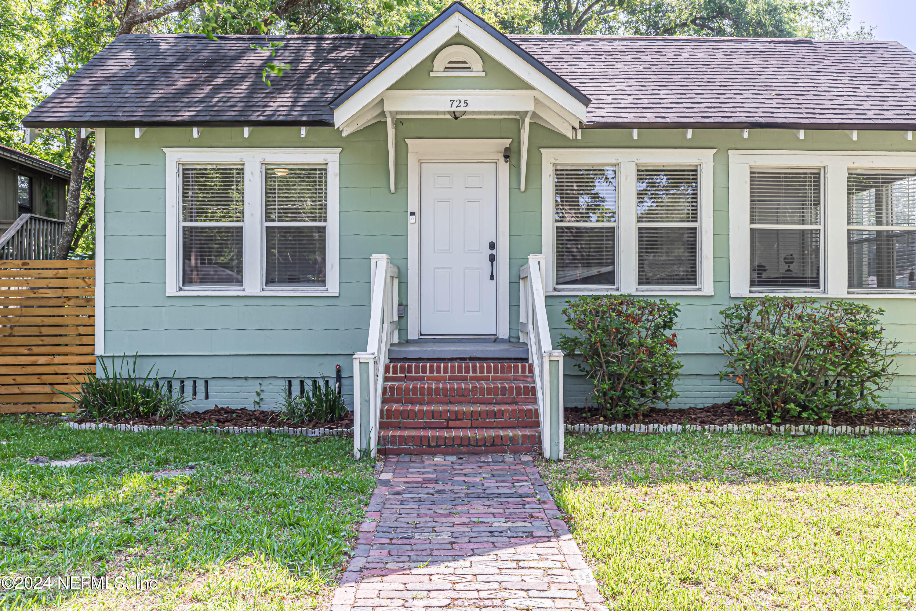 725 Cherokee Street Jacksonville, FL 32205 - Photo 2 of 41 a front view of a house with garden