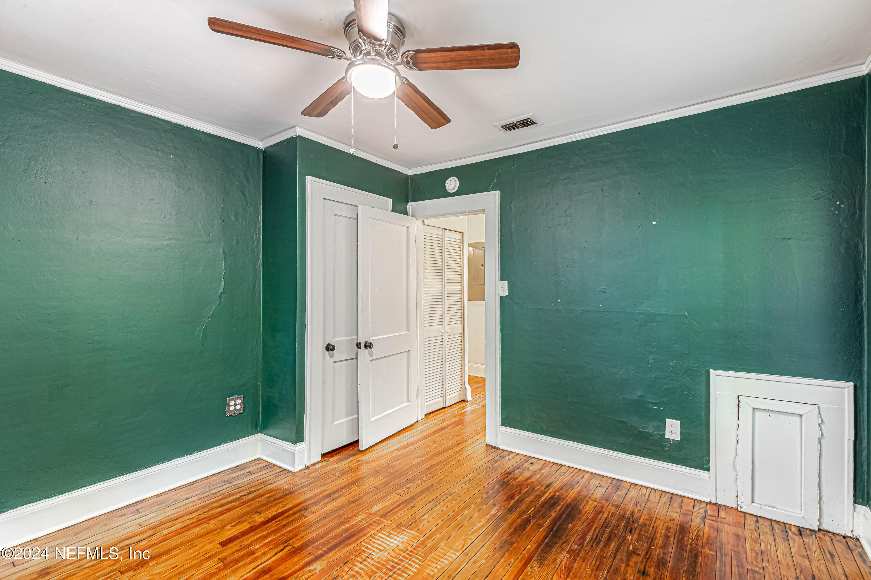 725 Cherokee Street Jacksonville, FL 32205 - Photo 24 of 41 a view of empty room with wooden floor