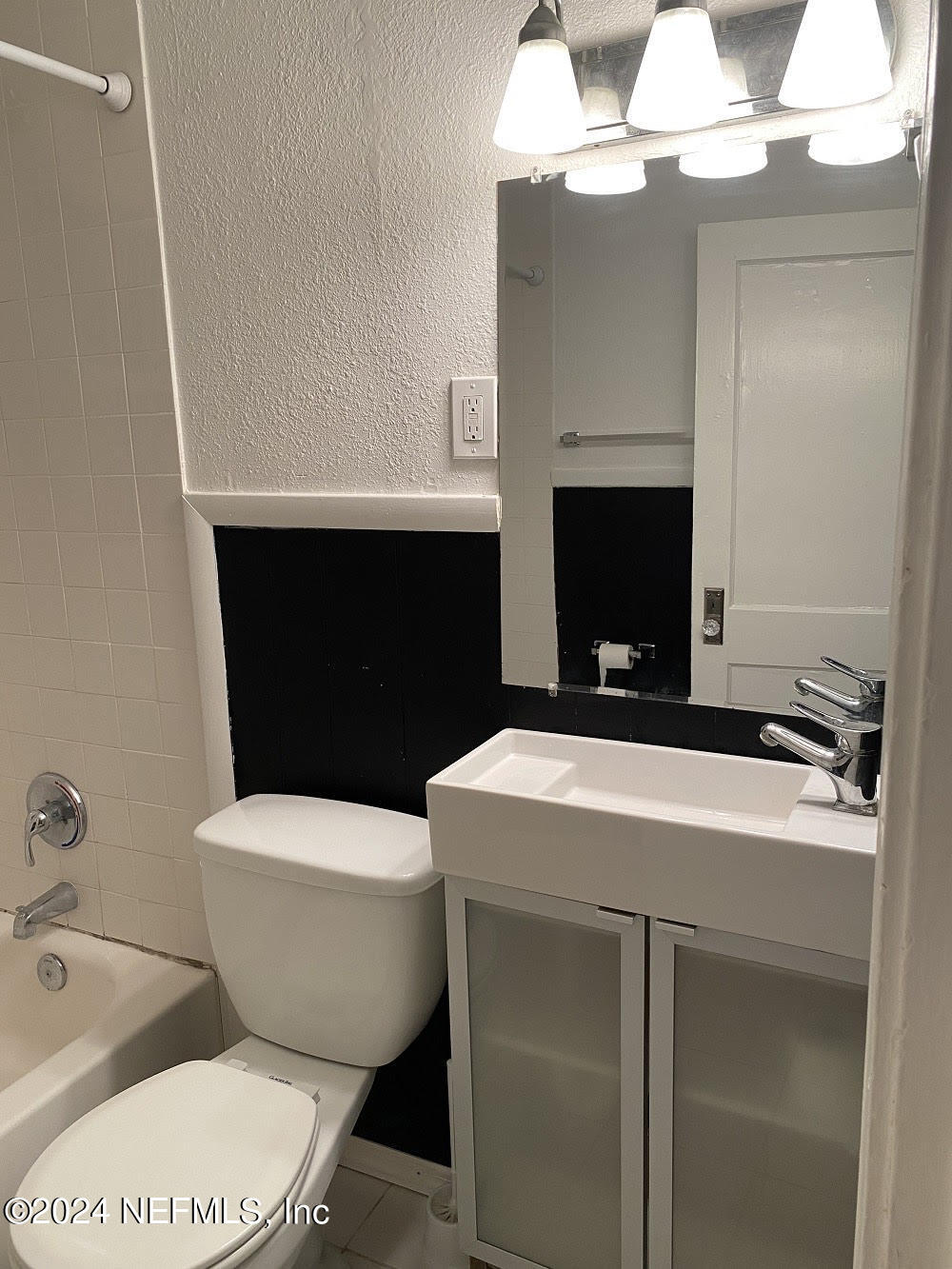 725 Cherokee Street Jacksonville, FL 32205 - Photo 41 of 41 a bathroom with a sink toilet and mirror
