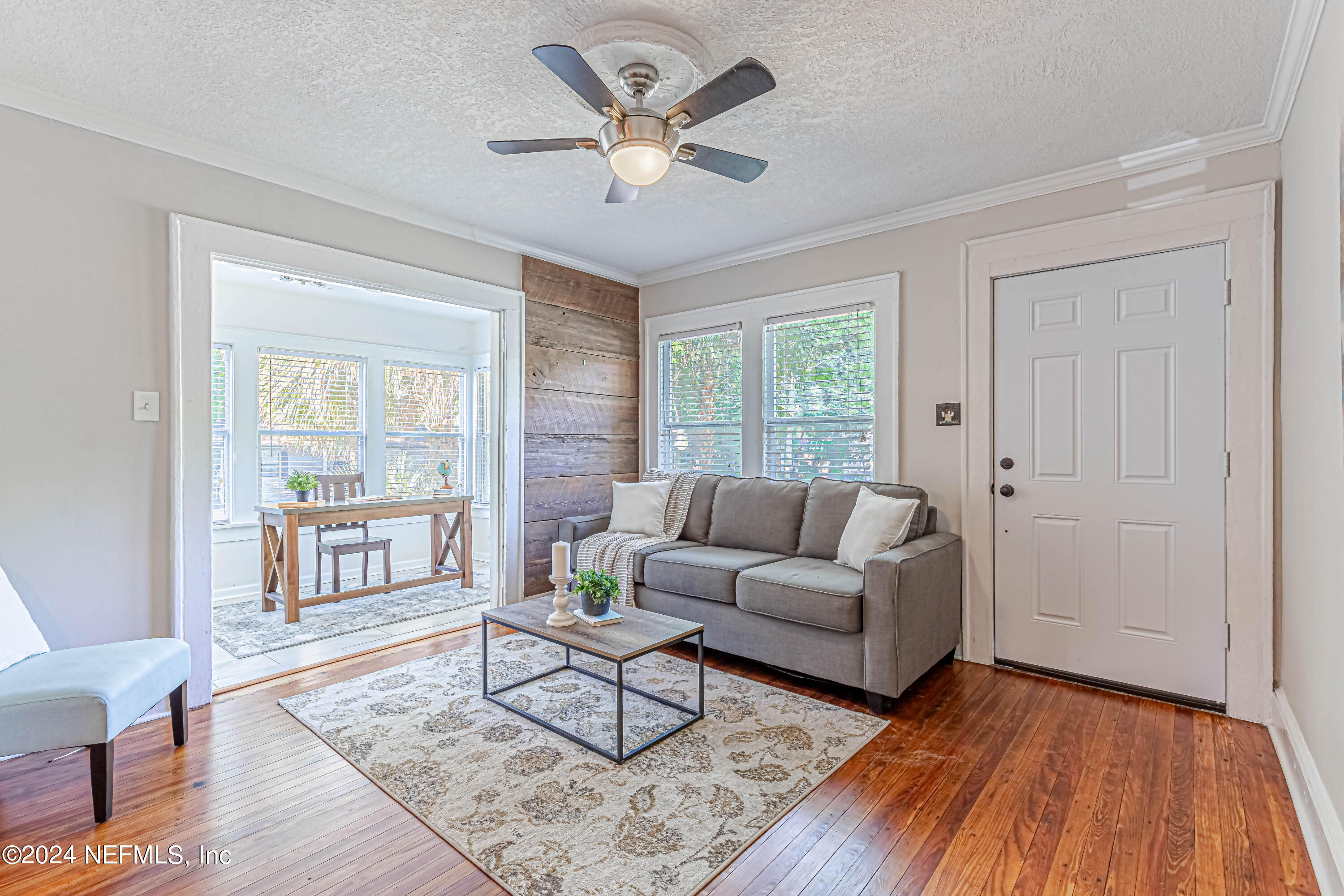 725 Cherokee Street Jacksonville, FL 32205 - Photo 6 of 41 a living room with furniture and a wooden floor