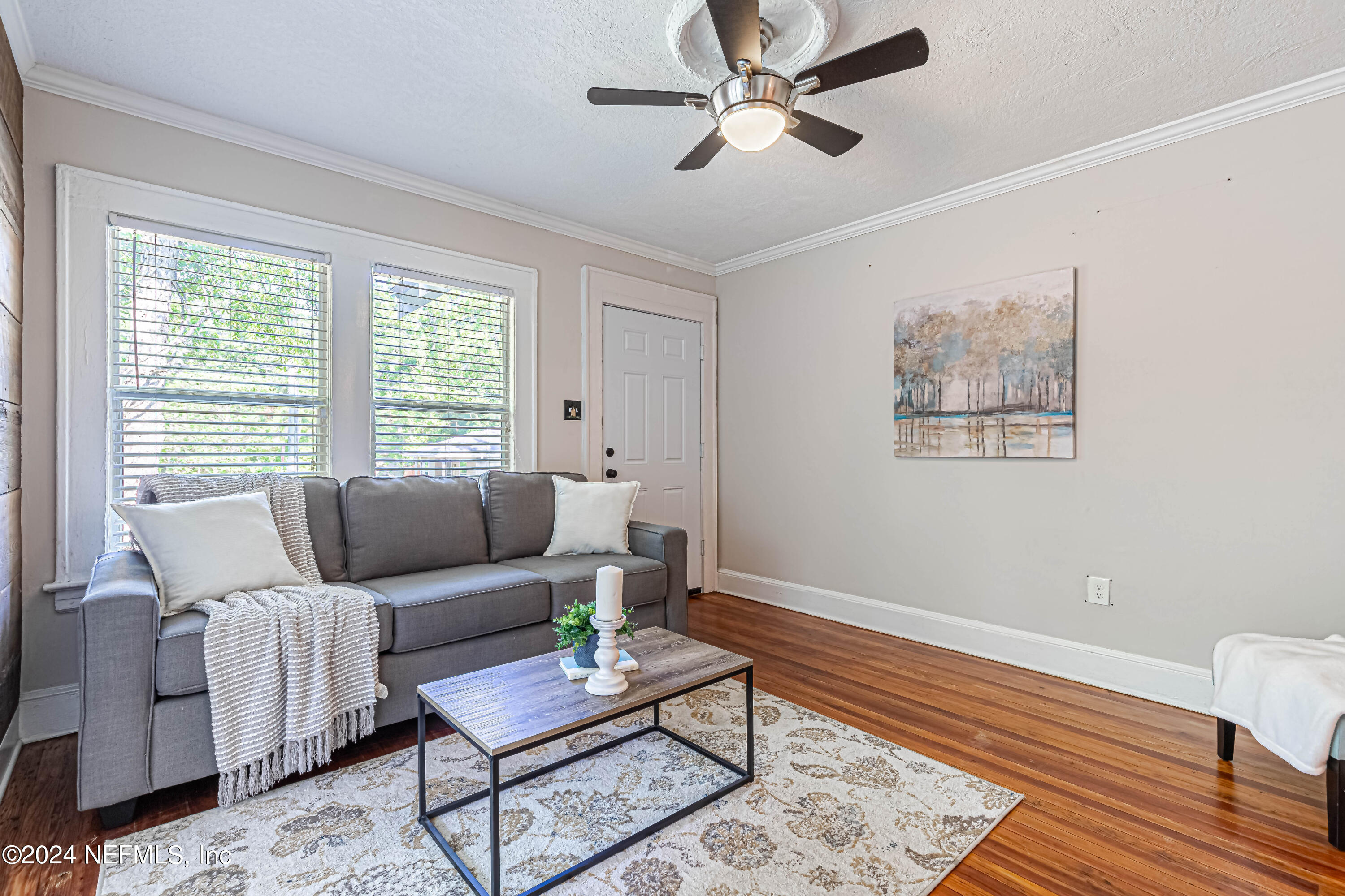 725 Cherokee Street Jacksonville, FL 32205 - Photo 7 of 41 a living room with furniture and a window