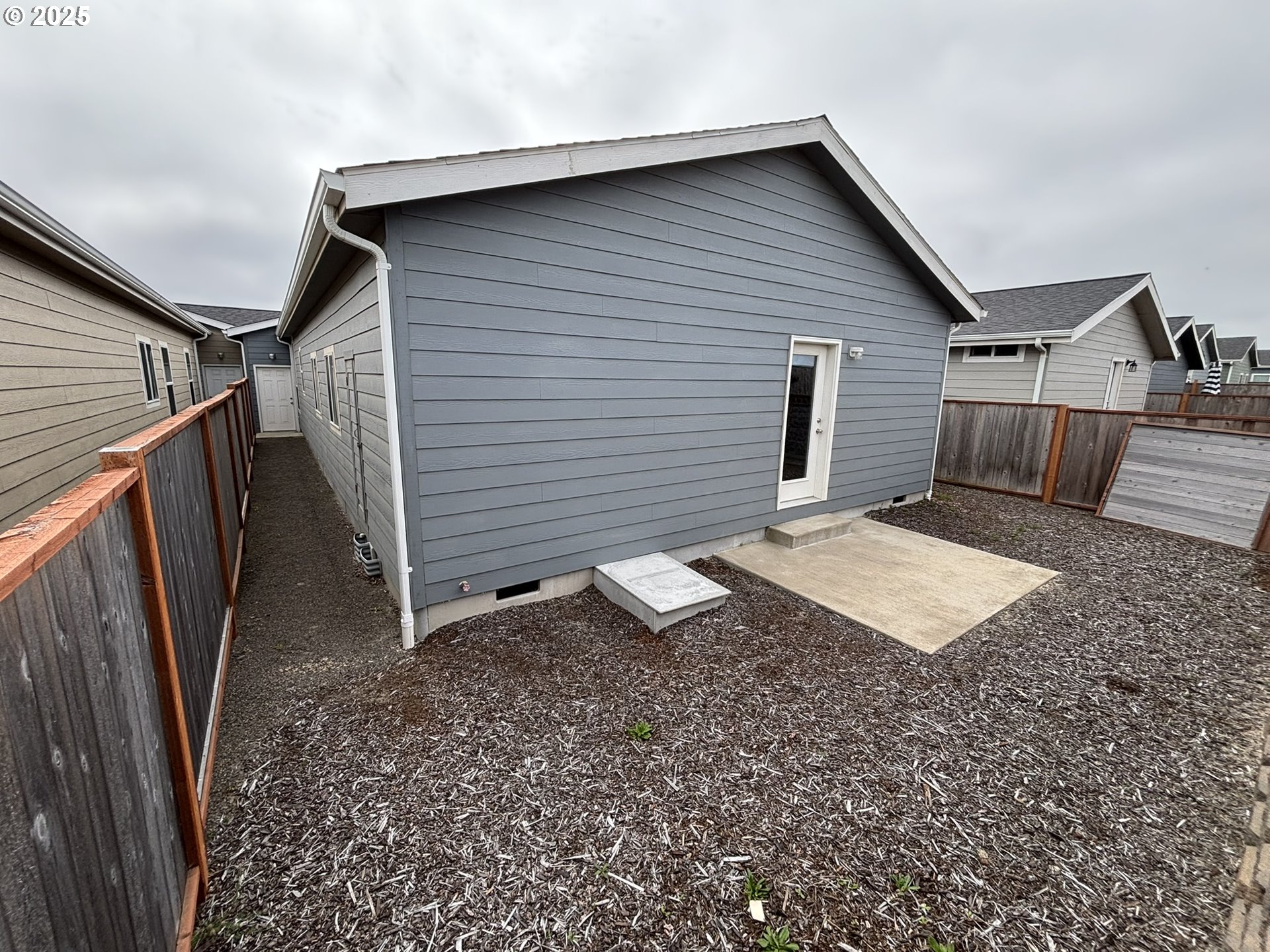 5270 Nopal Street Florence, OR 97439 - Photo 26 of 27 a view of a backyard