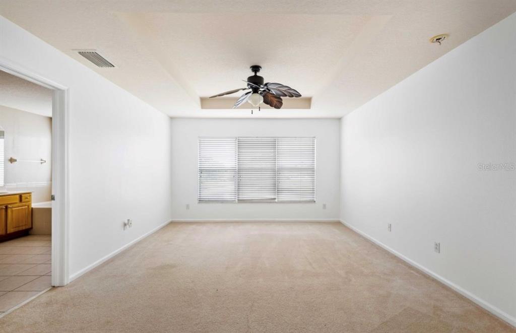 3533 Juneberry Drive Wesley Chapel, FL 33543 - Photo 7 of 12 a view of empty room with a window