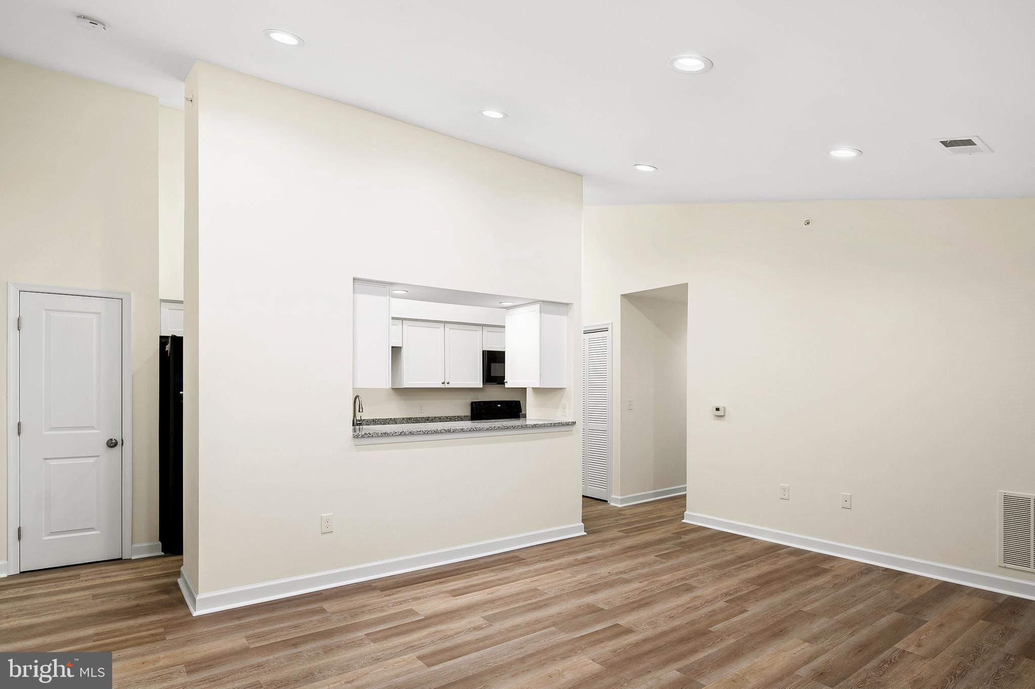 6335 Greenfield Road, Unit 1710 Elkridge, MD 21075 - Photo 7 of 20 Living Room to Kitchen