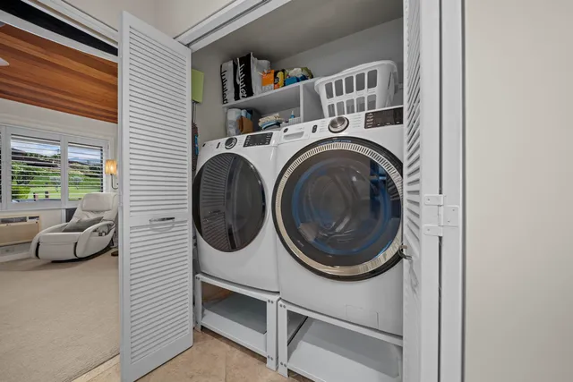 a utility room with dryer and washer