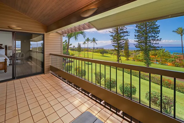 a view of balcony with furniture