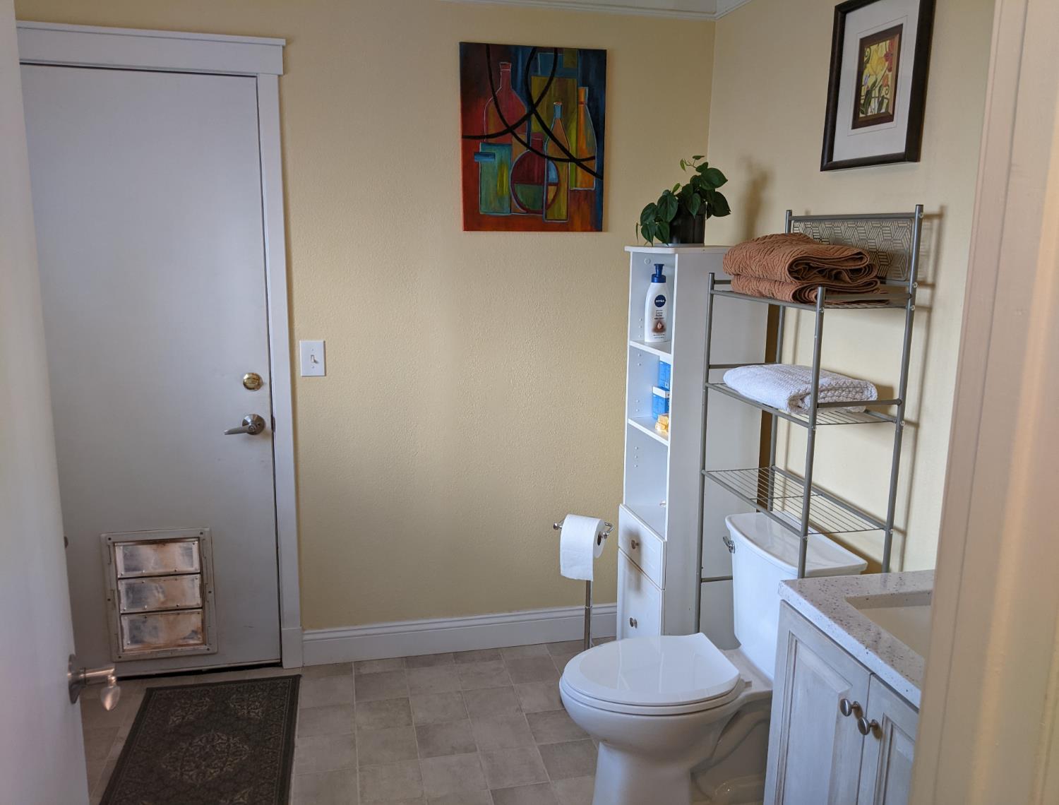 10180 Rock Creek Road Placerville, CA 95667 - Photo 24 of 51 a bathroom with a toilet a sink and a shower