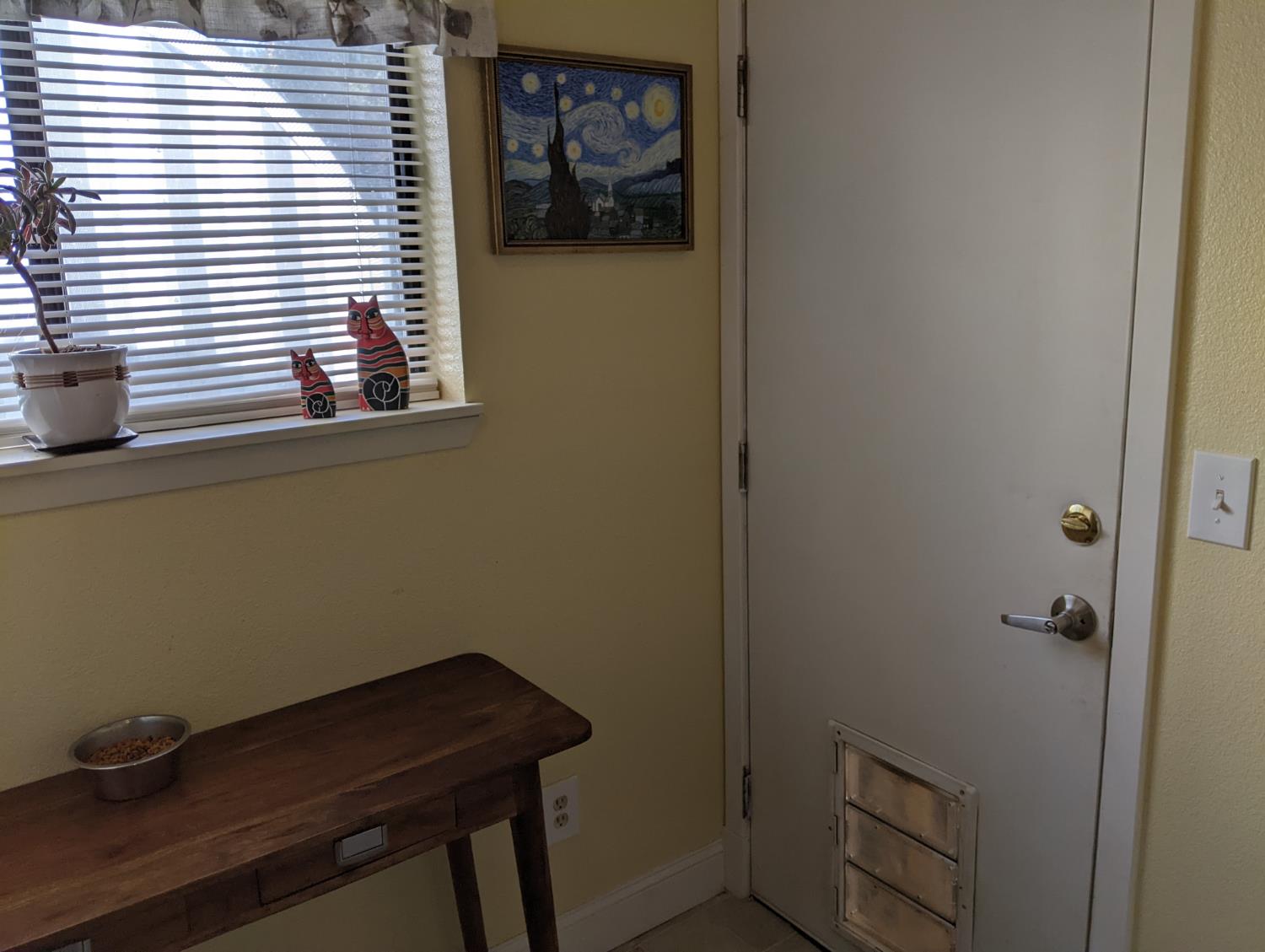 10180 Rock Creek Road Placerville, CA 95667 - Photo 25 of 51 a room that has a window and wooden floor