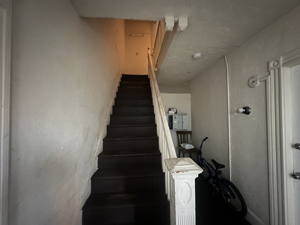 26 North Main Street, Unit 4 Natick, MA 01760 - Photo 11 of 13 a view of a hallway with front door