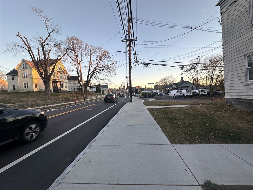 26 North Main Street, Unit 4 Natick, MA 01760 - Photo 12 of 13 a view of a street with cars on road