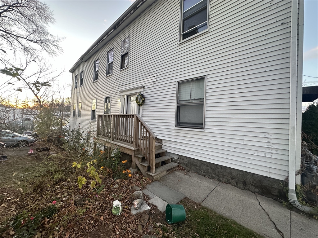 26 North Main Street, Unit 4 Natick, MA 01760 - Photo 10 of 13 a view of a house with a yard and sitting area
