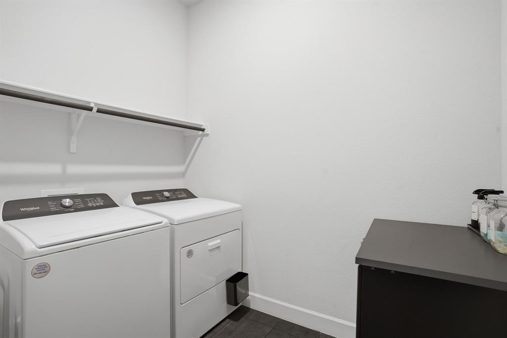 1632 Cotton Road Van Alstyne, TX 75495 - Photo 22 of 40 a utility room with dryer and washer