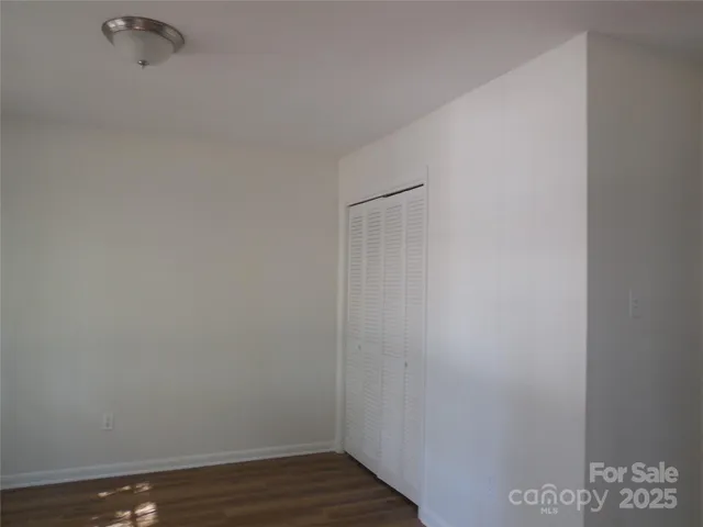 a view of small space with wooden floor