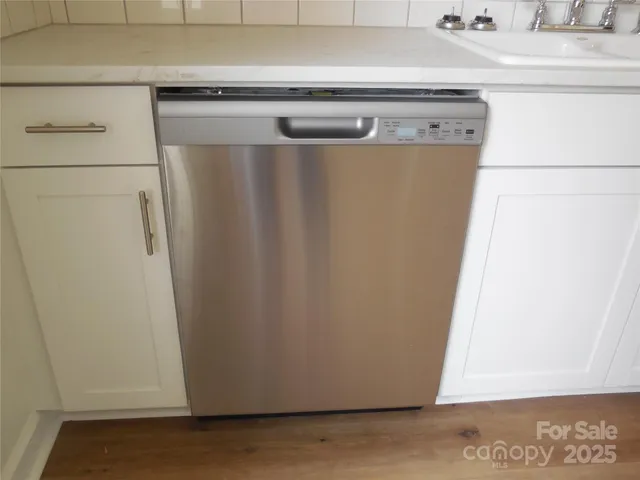 a view of a refrigerator in kitchen