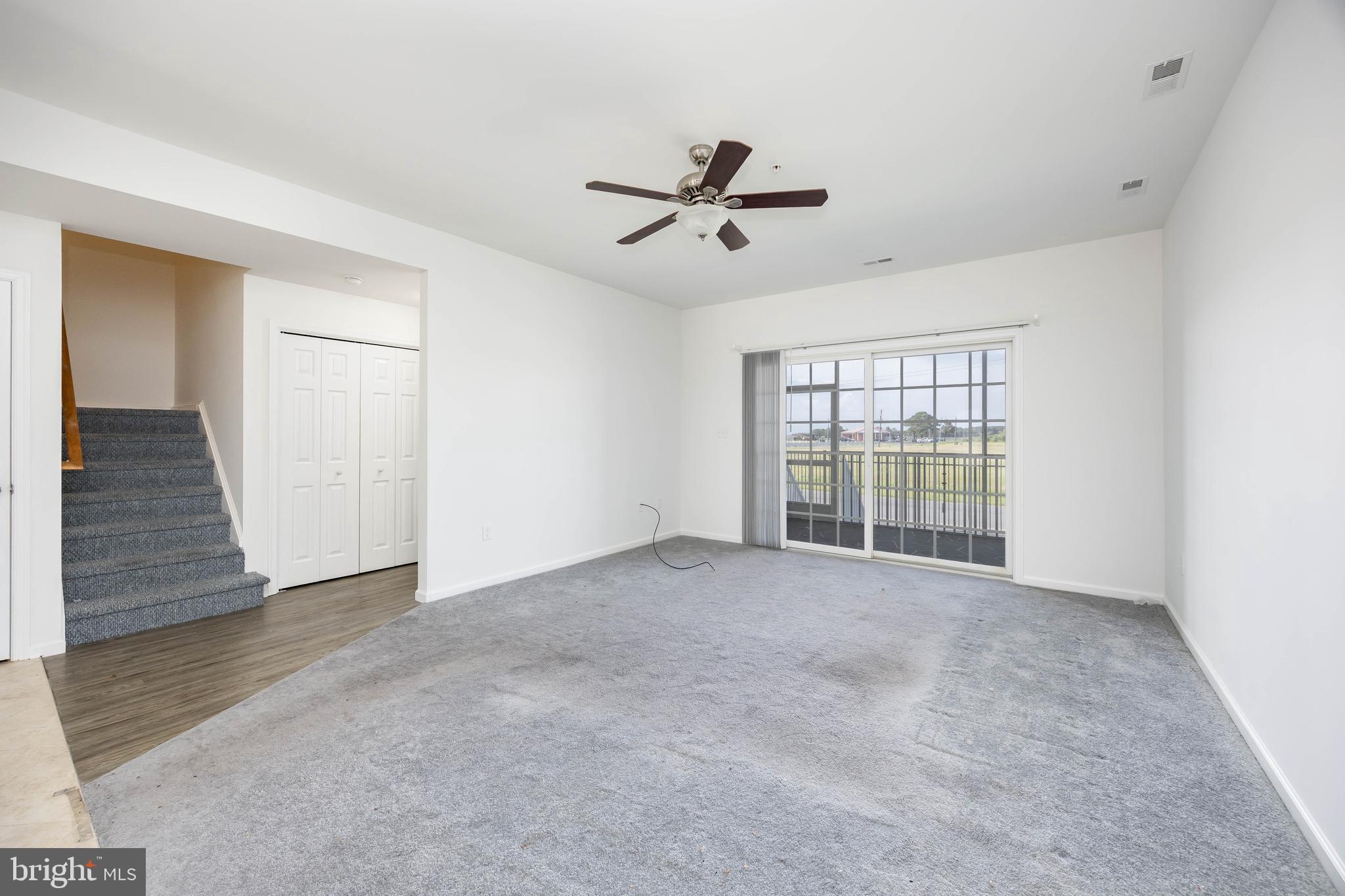 111 Sunset Circle, Unit 111E Crisfield, MD 21817 - Photo 25 of 57 a view of an empty room with a window