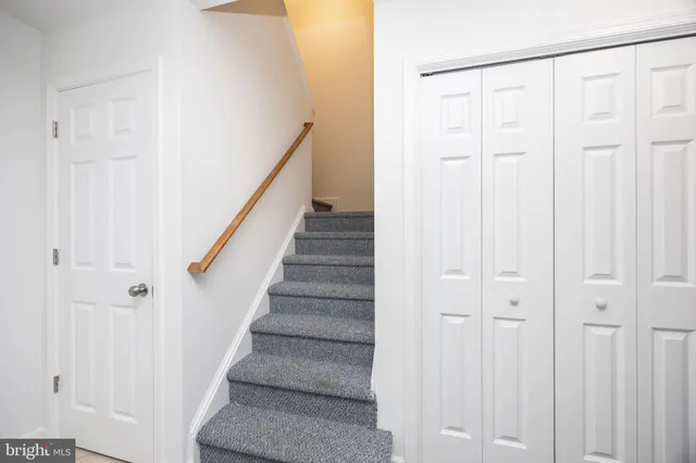 wooden floor with a ceiling fan