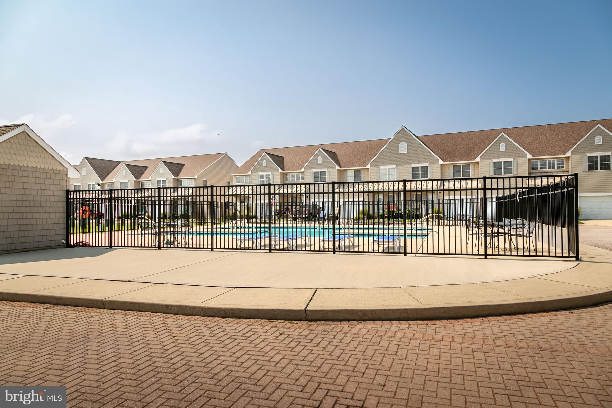 111 Sunset Circle, Unit 111E Crisfield, MD 21817 - Photo 3 of 57 pool directly across street