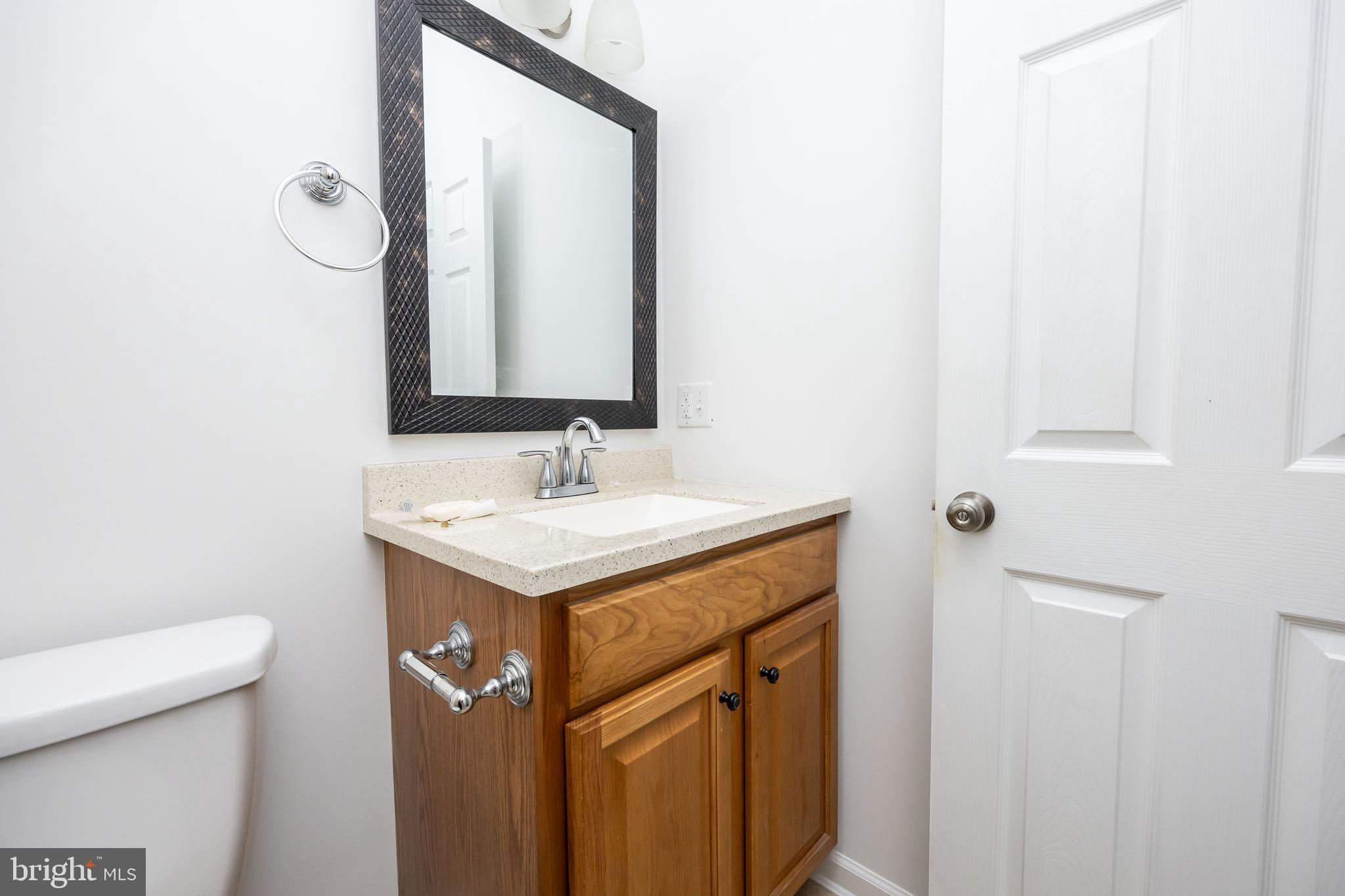 111 Sunset Circle, Unit 111E Crisfield, MD 21817 - Photo 31 of 57 a utility room with dryer and washer