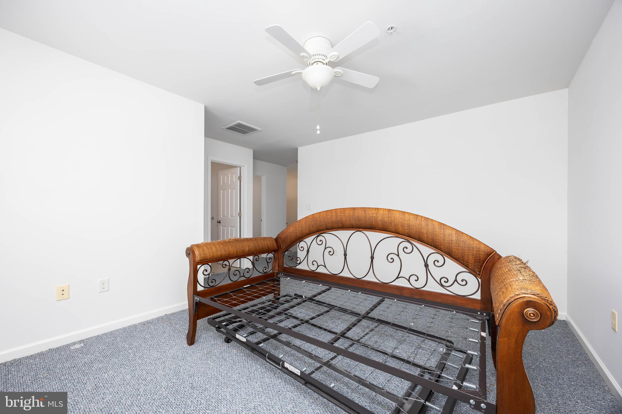 111 Sunset Circle, Unit 111E Crisfield, MD 21817 - Photo 35 of 57 a view of staircase with a table