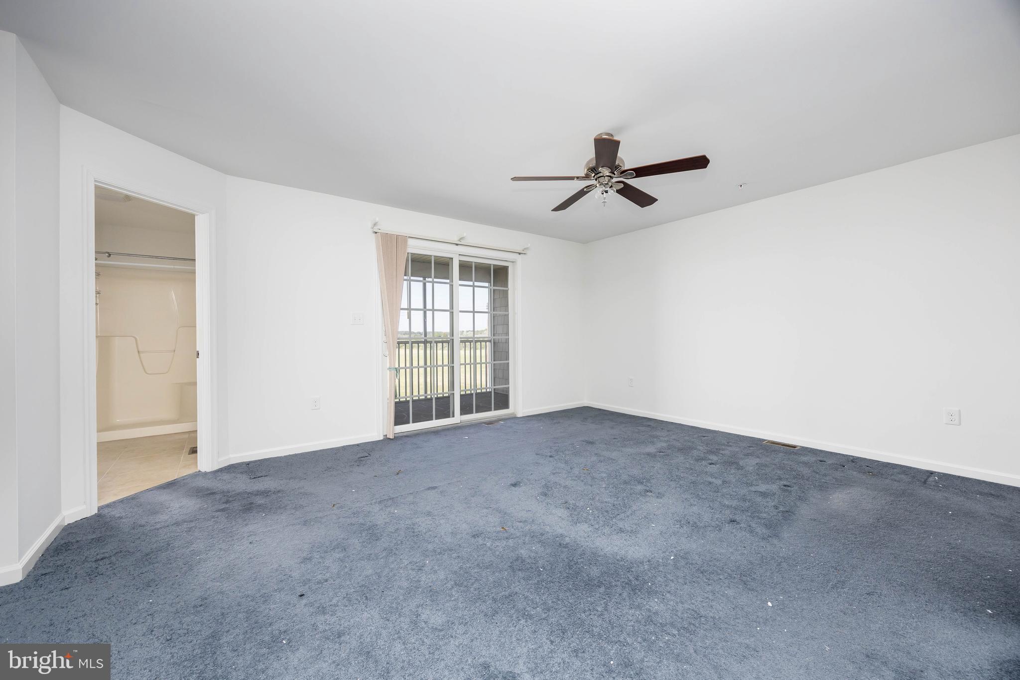 111 Sunset Circle, Unit 111E Crisfield, MD 21817 - Photo 41 of 57 a view of an empty room with a window