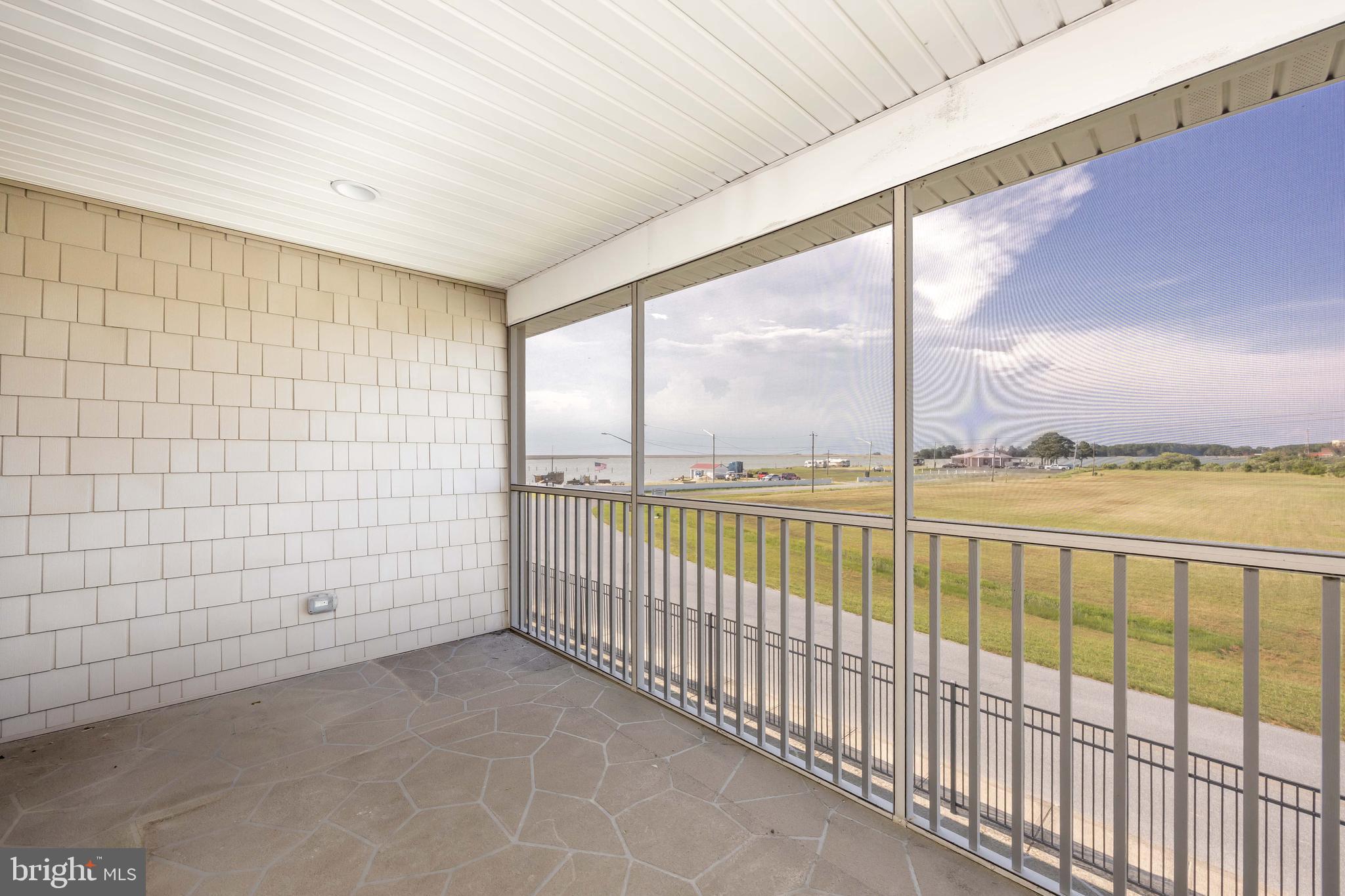 111 Sunset Circle, Unit 111E Crisfield, MD 21817 - Photo 50 of 57 a view of a balcony