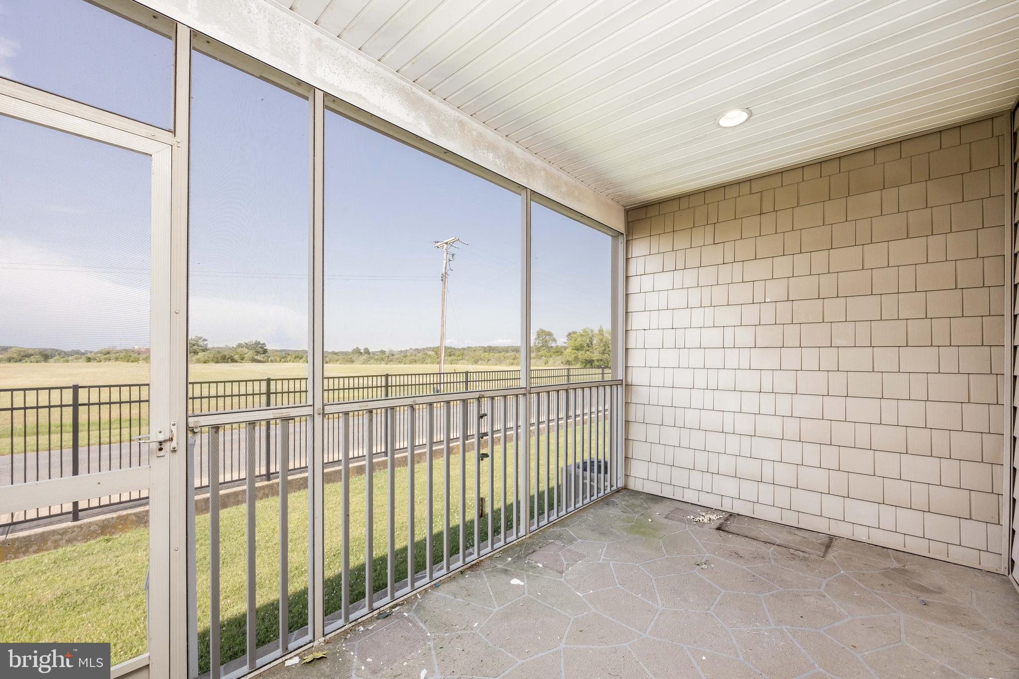111 Sunset Circle, Unit 111E Crisfield, MD 21817 - Photo 52 of 57 a view of a balcony