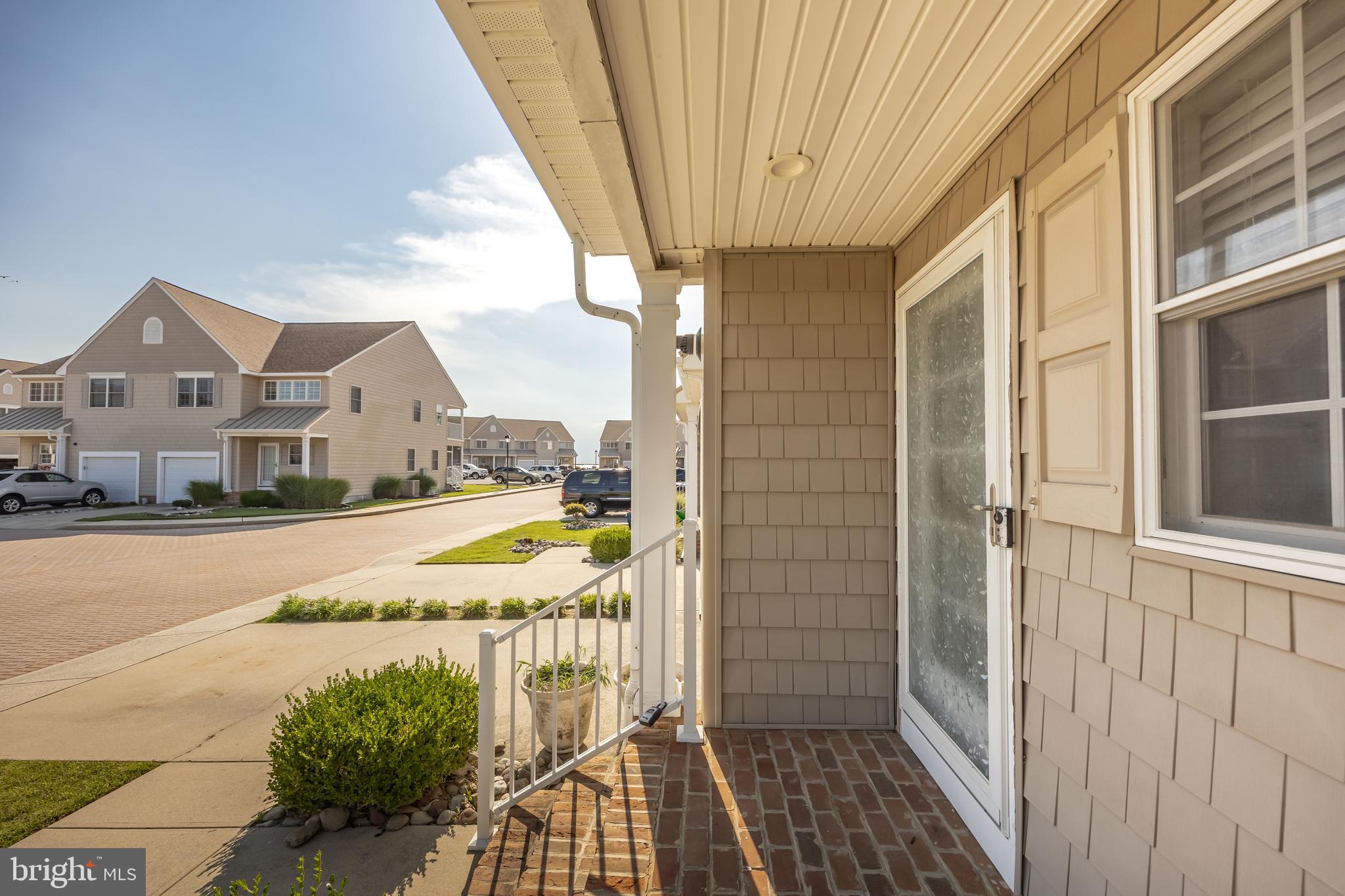 111 Sunset Circle, Unit 111E Crisfield, MD 21817 - Photo 56 of 57 a view of a house with a swimming pool