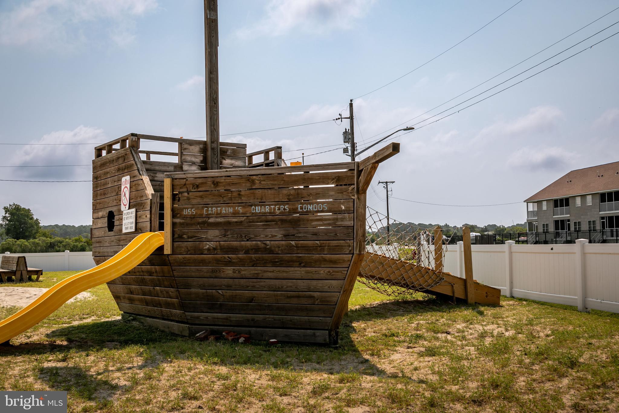 111 Sunset Circle, Unit 111E Crisfield, MD 21817 - Photo 6 of 57 a view of outdoor space with seating area