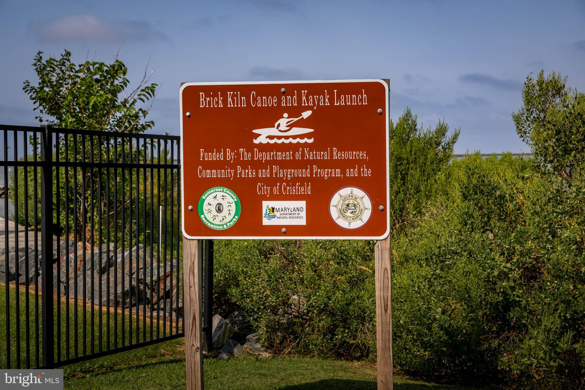 111 Sunset Circle, Unit 111E Crisfield, MD 21817 - Photo 8 of 57 a sign that is on the side of a building