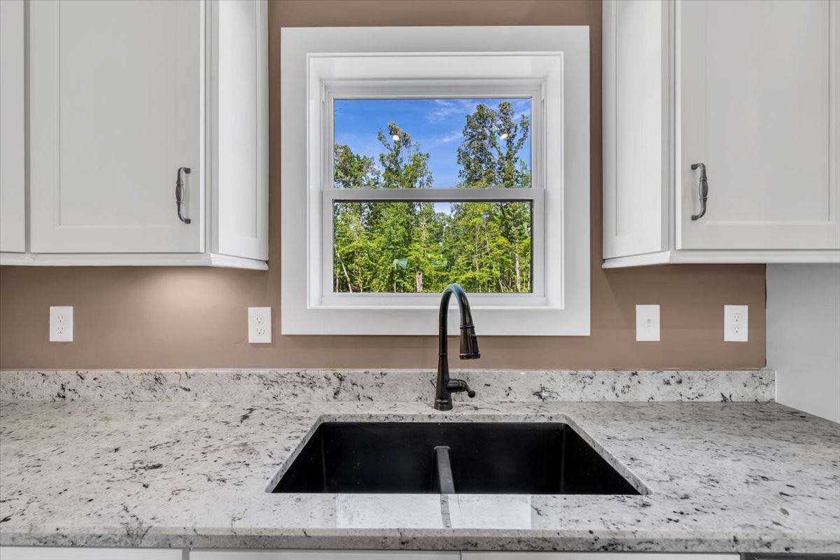 71 Brinkley Road Wartrace, TN 37183 - Photo 13 of 42 a kitchen with a sink and cabinets