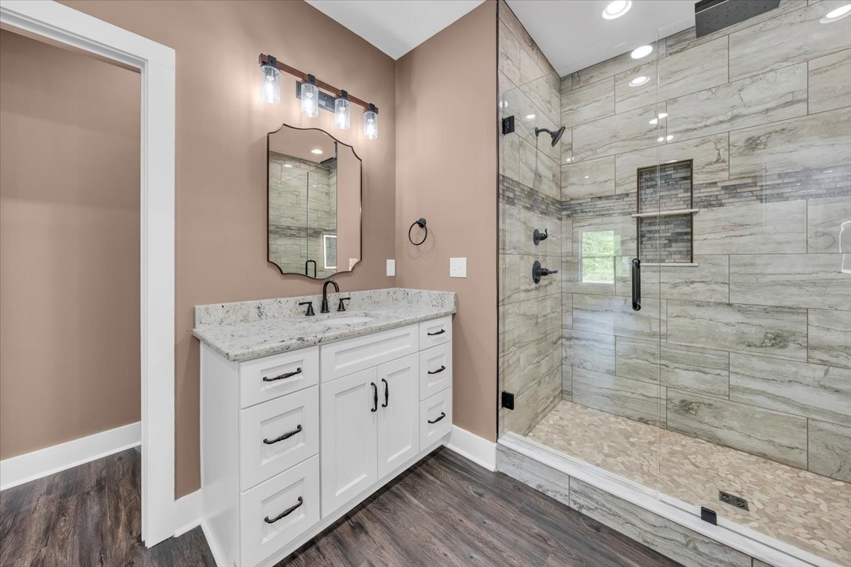 71 Brinkley Road Wartrace, TN 37183 - Photo 20 of 42 a bathroom with a granite countertop sink mirror and shower