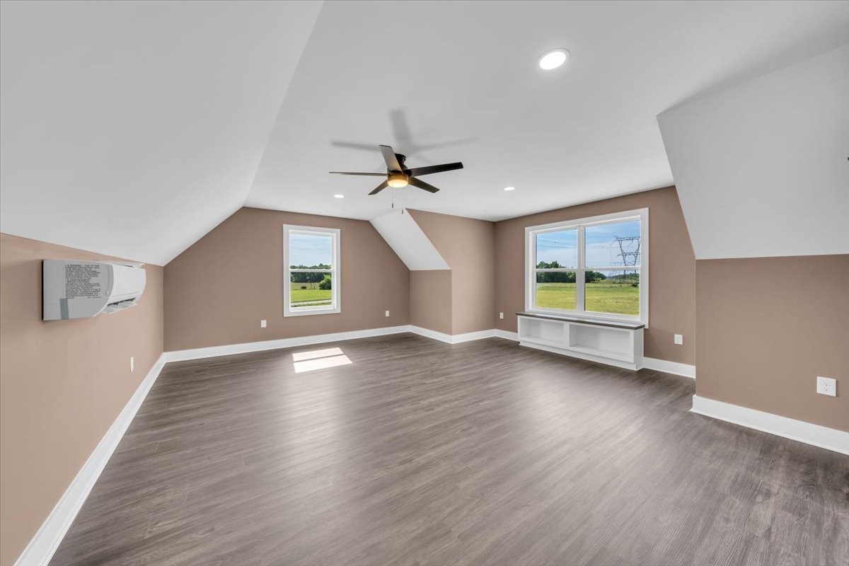 71 Brinkley Road Wartrace, TN 37183 - Photo 28 of 42 a view of an empty room with window and wooden floor