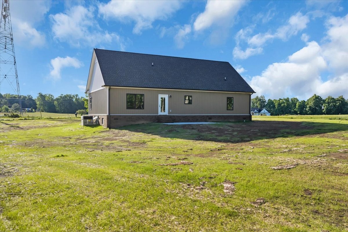 71 Brinkley Road Wartrace, TN 37183 - Photo 34 of 42 a view of a house with a yard