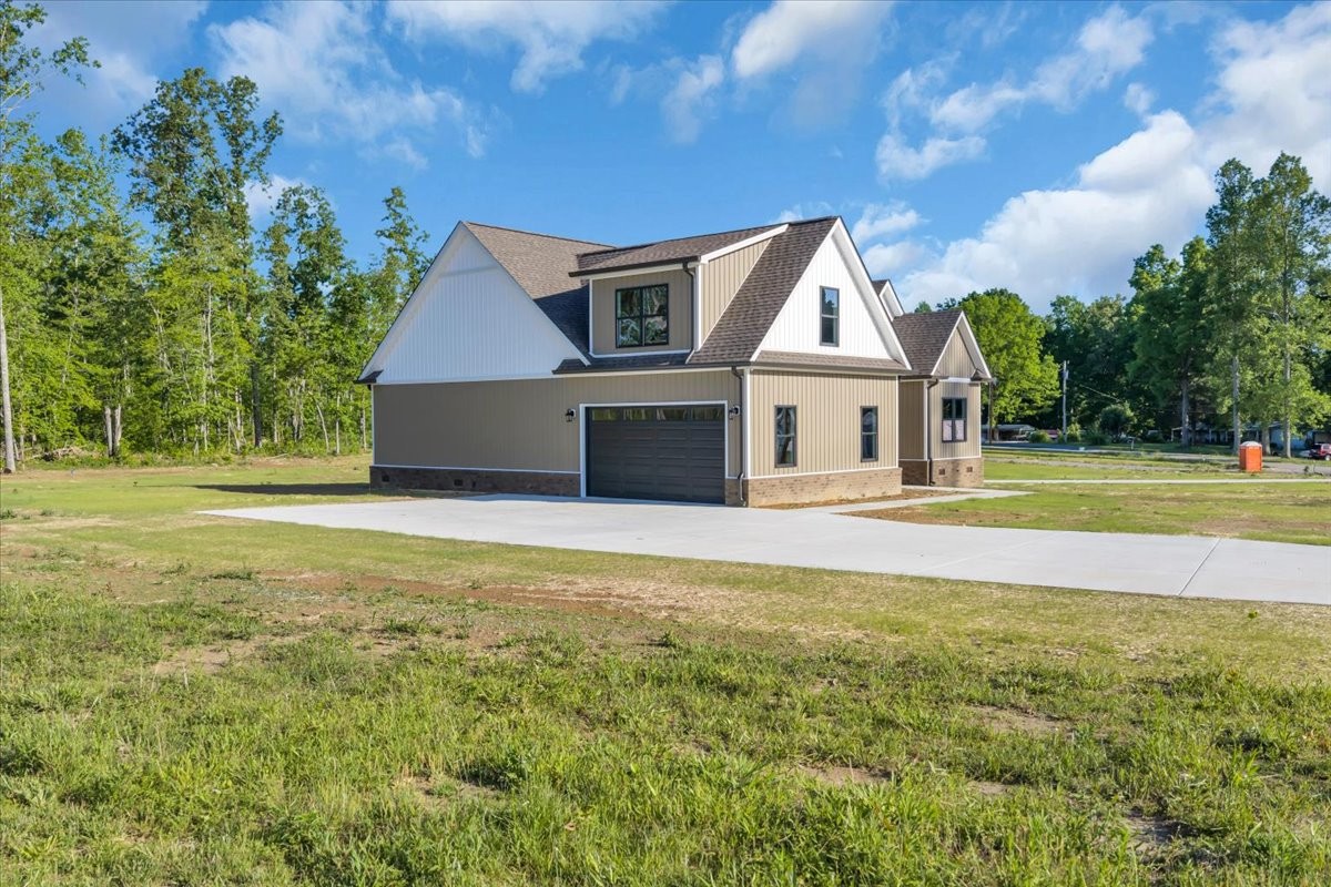 71 Brinkley Road Wartrace, TN 37183 - Photo 38 of 42 a view of a house with a yard
