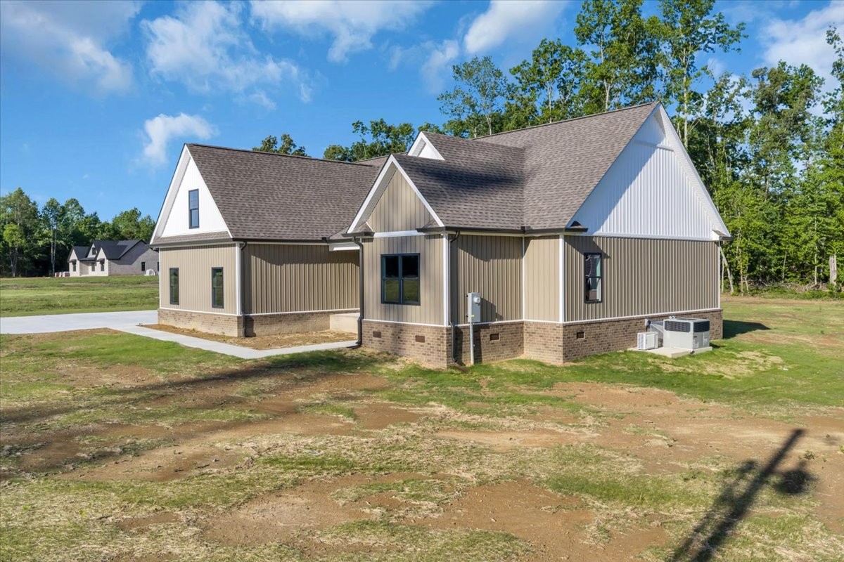 71 Brinkley Road Wartrace, TN 37183 - Photo 40 of 42 a view of a house with a yard