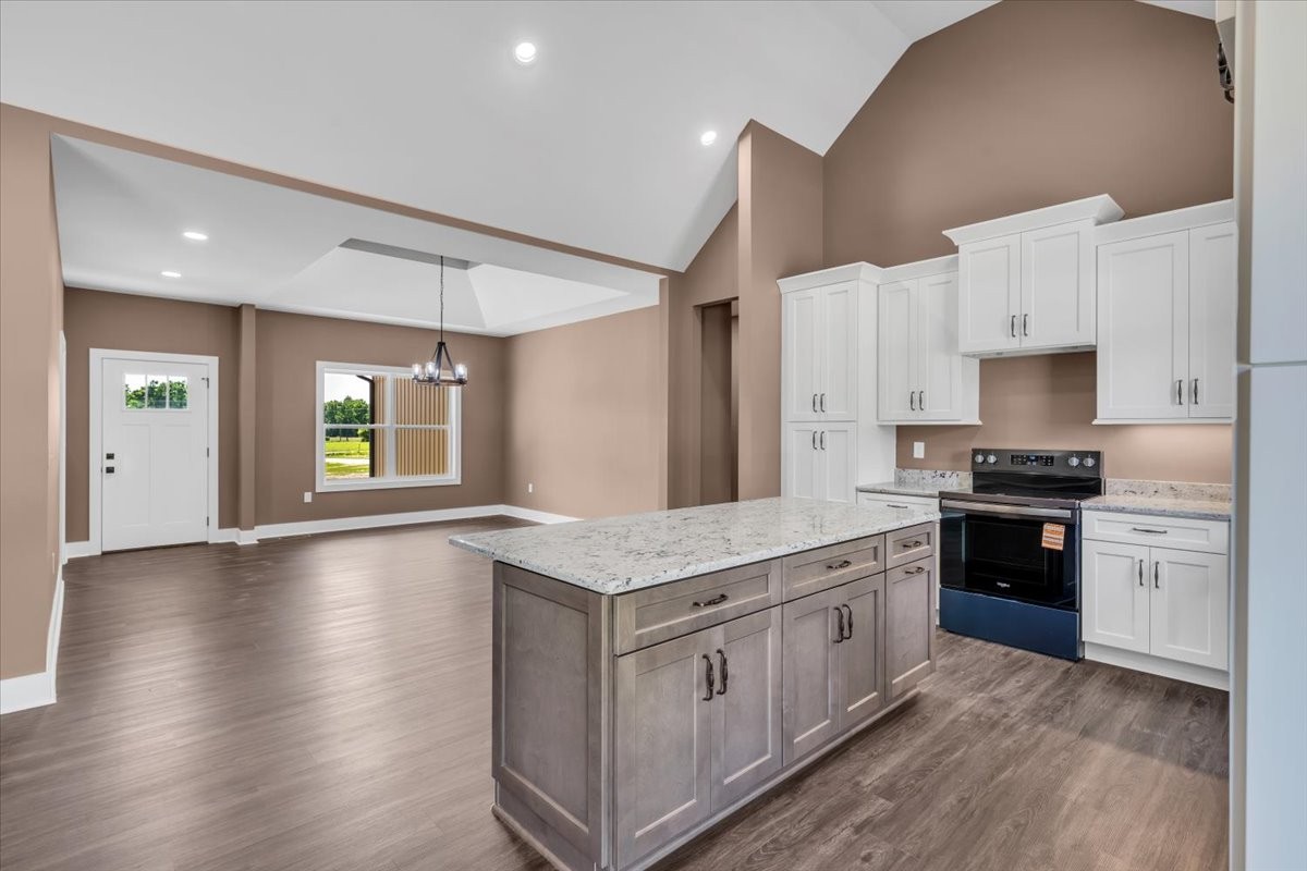 71 Brinkley Road Wartrace, TN 37183 - Photo 6 of 42 a kitchen with stainless steel appliances granite countertop a stove a sink and a refrigerator