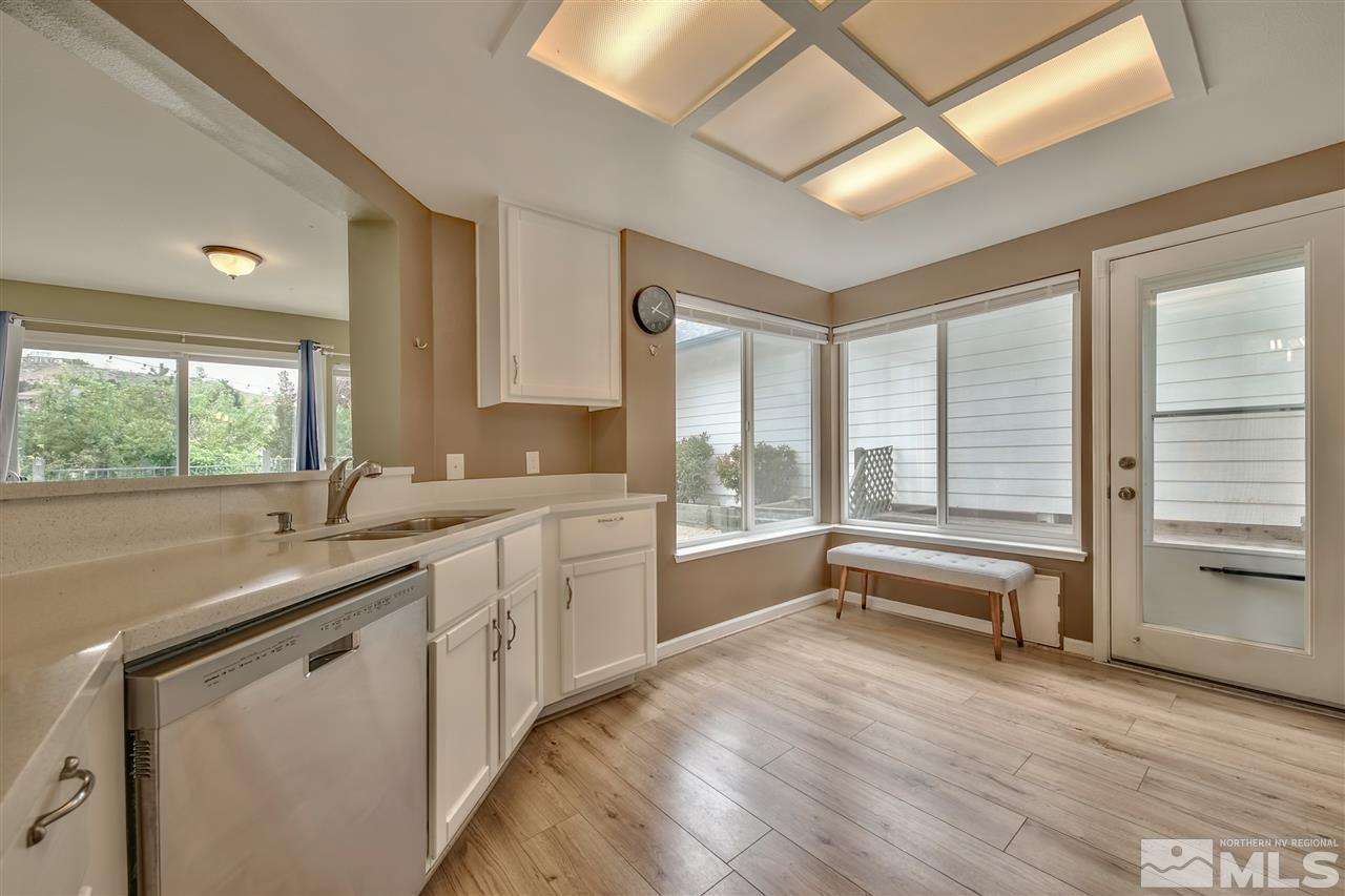 2640 Alpine Creek Road Reno, NV 89519 - Photo 8 of 24 a kitchen with a sink and large windows