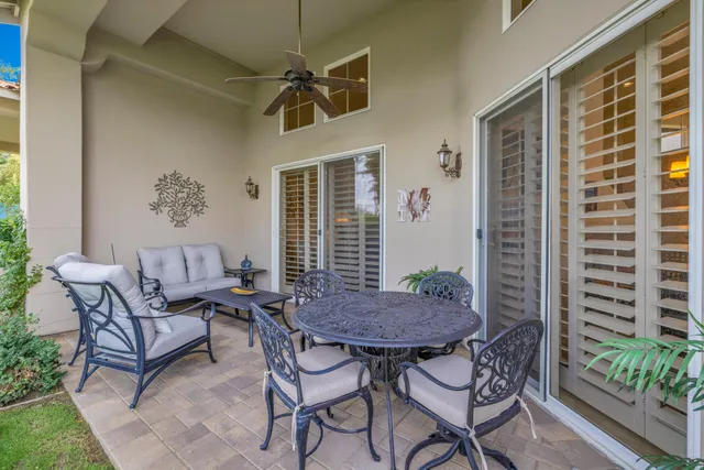 a view of a livingroom with furniture and a yard