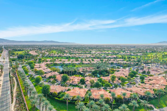 a view of a city with mountains in the background