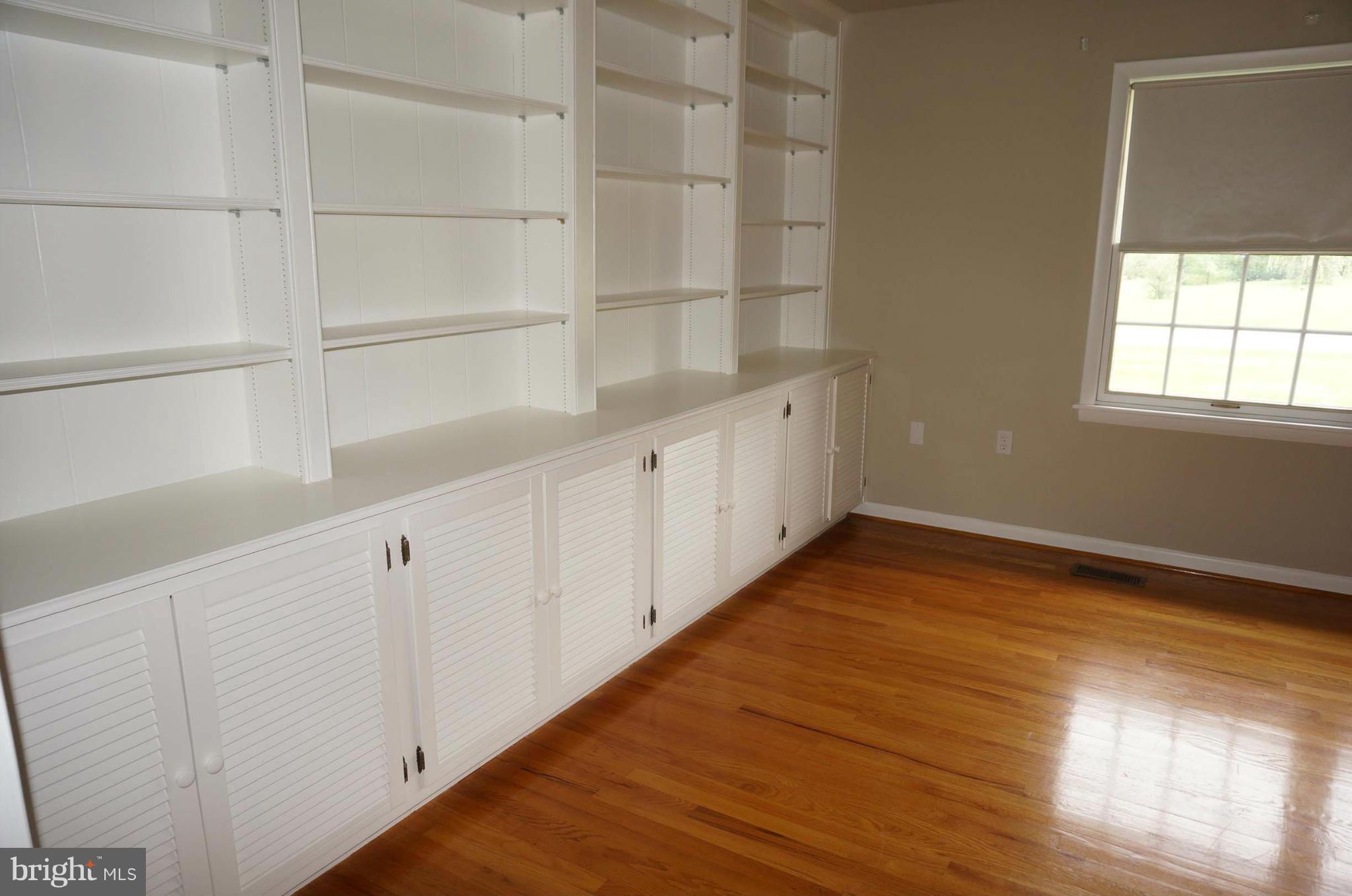 7932 Edgewood Farm Road Frederick, MD 21702 - Photo 5 of 30 Living Room with Built in Cabinets and Shelves