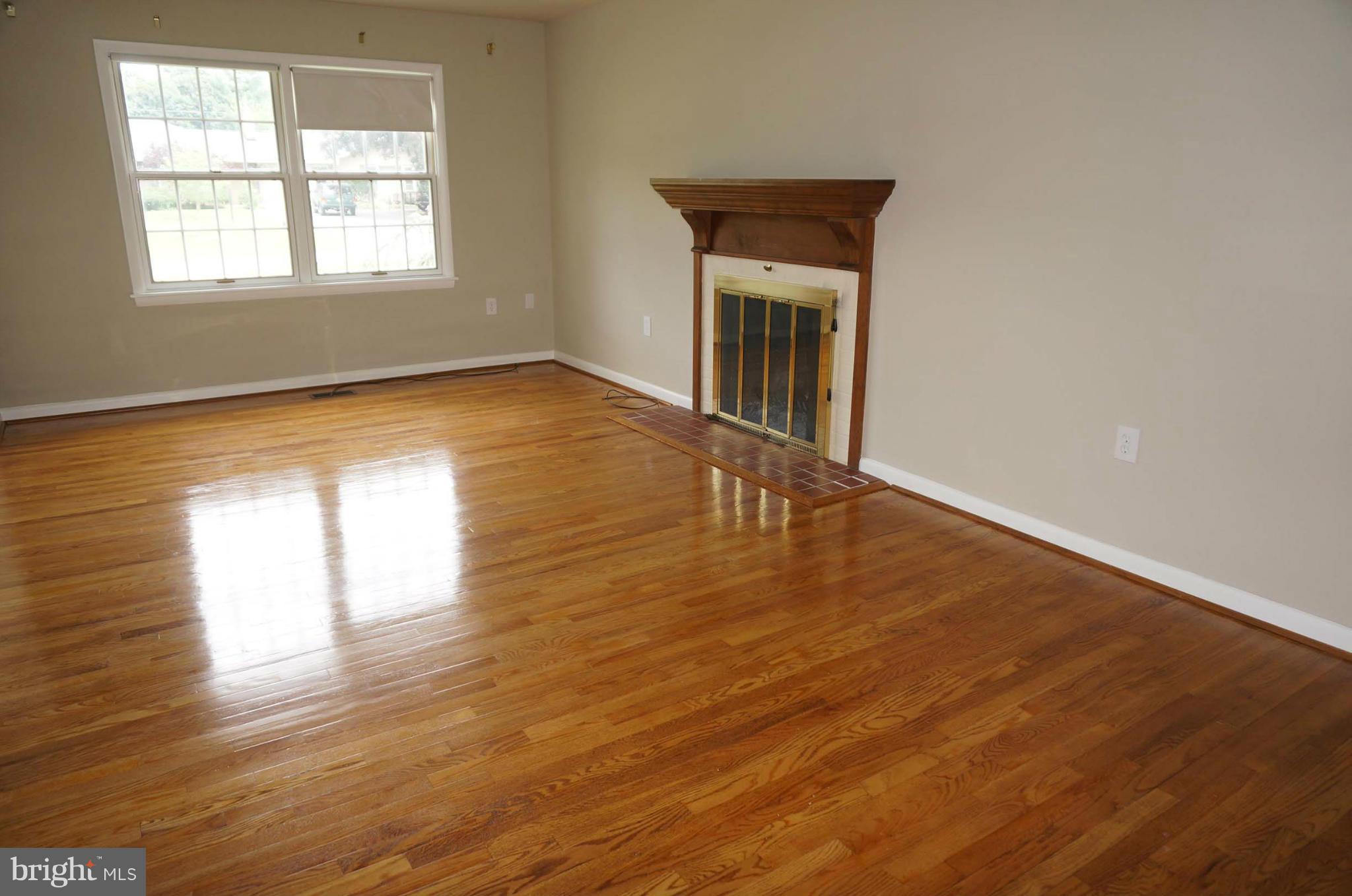 7932 Edgewood Farm Road Frederick, MD 21702 - Photo 8 of 30 Family Room with Fire place and mantle