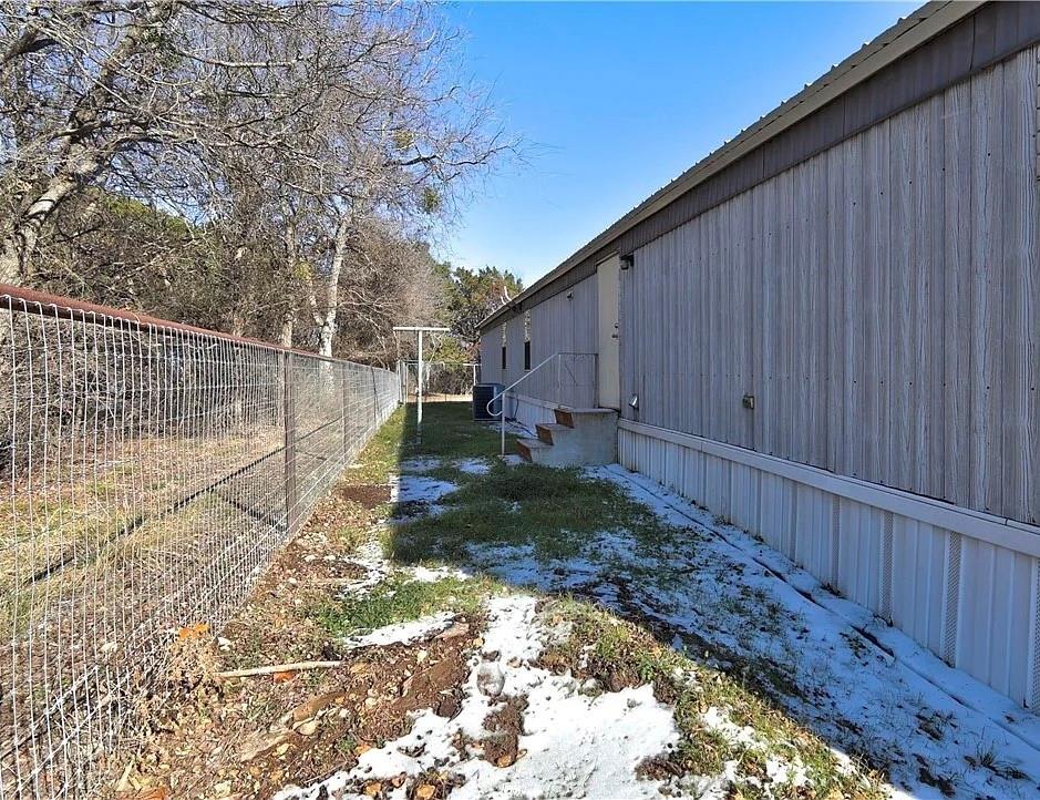 3697 Fm 2808 Road Kempner, TX 76539 - Photo 18 of 18 Chain link fence with a top rail, bordering a perimeter of trees