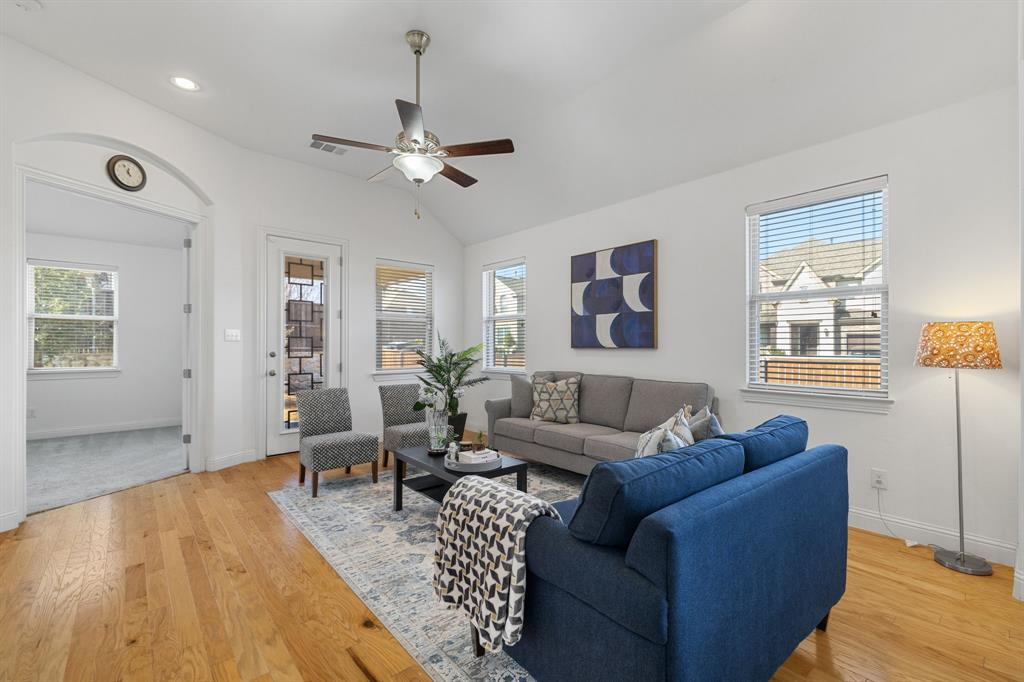 5504 Ripasso Street McKinney, TX 75070 - Photo 12 of 40 a living room with furniture and a wooden floor