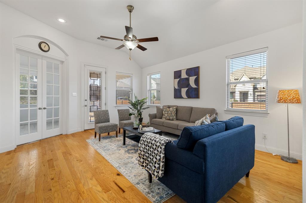 5504 Ripasso Street McKinney, TX 75070 - Photo 13 of 40 a living room with furniture and a wooden floor
