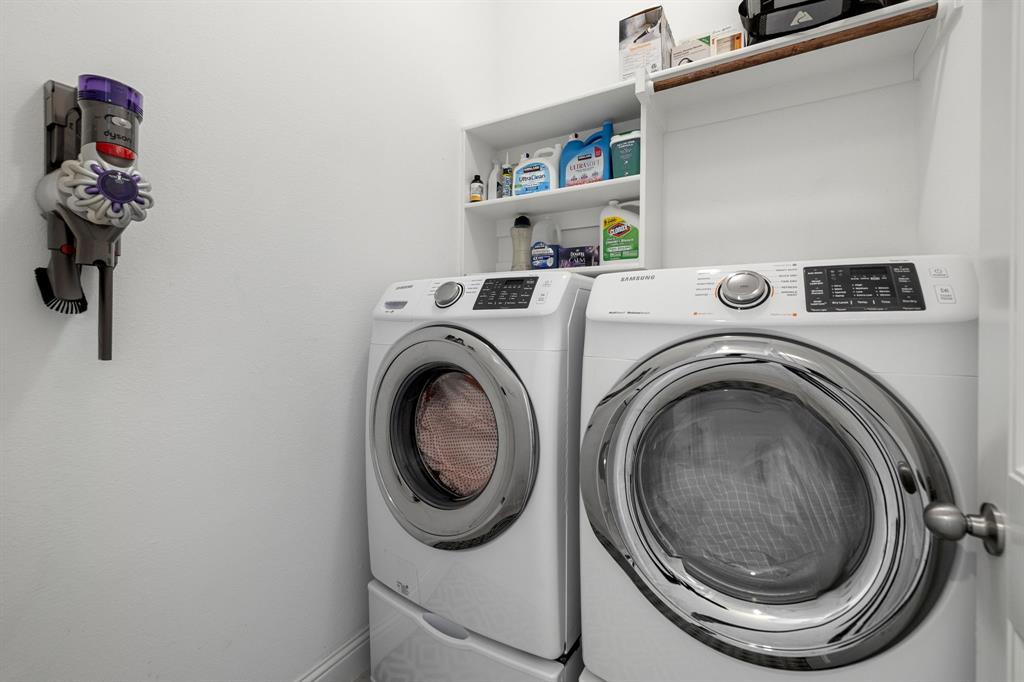 5504 Ripasso Street McKinney, TX 75070 - Photo 19 of 40 a utility room with dryer and washer