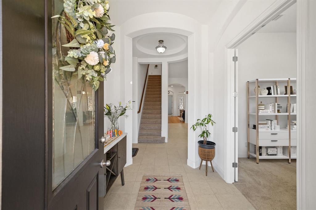 5504 Ripasso Street McKinney, TX 75070 - Photo 2 of 40 a view of a hallway with seating area