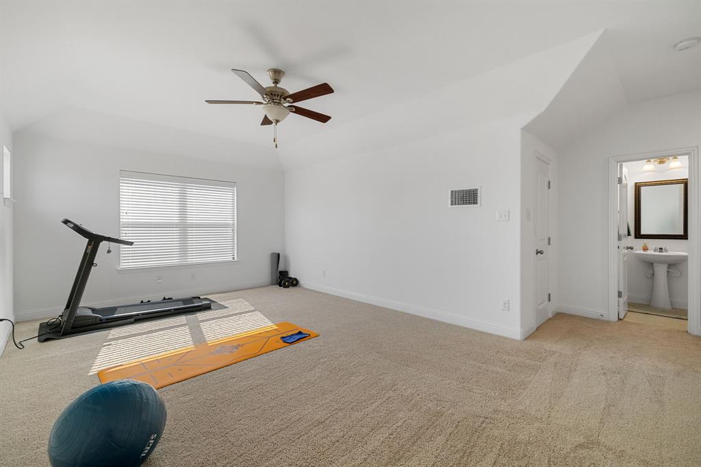 5504 Ripasso Street McKinney, TX 75070 - Photo 23 of 40 a room with gym equipment and a window