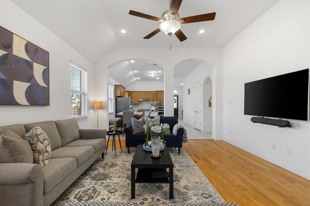 5504 Ripasso Street McKinney, TX 75070 - Photo 31 of 40 a living room with furniture and a flat screen tv