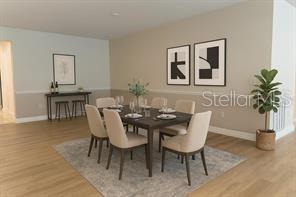 7845 Wandering Way Orlando, FL 32836 - Photo 11 of 61 a view of a dining room with furniture and wooden floor